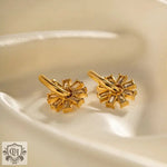 Elegant 18K Gold Snowflake Zircon Earrings featuring flower design with gemstones