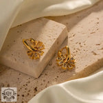 Elegant 18K Gold Snowflake Zircon Earrings with a floral design for sophisticated style