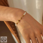 18K gold retro fashion special-shaped water drop and pearl design bracelet - QH Clothing