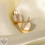 18K Gold Square Opal Drop Earrings featuring gold-framed milky square earrings