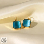 18K Gold Square Opal Drop Earrings featuring blue opal in a gold frame design