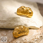 Elegant 18k gold chubby croissant earrings featuring a unique texture design