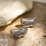 Two silver chubby croissant texture design earrings in 18k gold styling