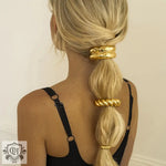 Blonde hair styled with 18K gold trendy double-layer U-shaped hair accessory