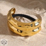 Gold-toned hammered metal hair accessory, 18K gold U-shaped design for trendy styles