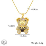 Gold teddy bear pendant necklace featuring an 18K gold bear diamond design