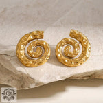 Hammered gold spiral earrings featuring a unique snail shape in elegant 18K gold