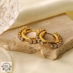 Gold hoop earrings featuring embedded crystals and 18K Gold White Square Zircon design