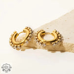 Gold hoop earrings with embedded crystals showcasing 18K Gold White Square Zircon design