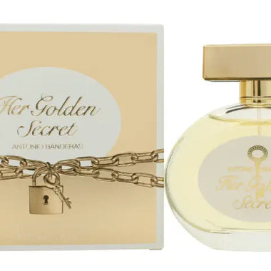 Perfume bottle with gold cap and chain next to Antonio Banderas Golden Secret Eau box