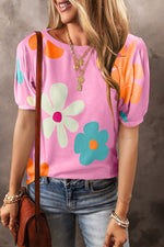 Pink floral print bubble sleeve tee paired with blue jeans, perfect for casual relax