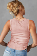 Pink ribbed tank top with a fitted silhouette, available in sizes for bust and waist