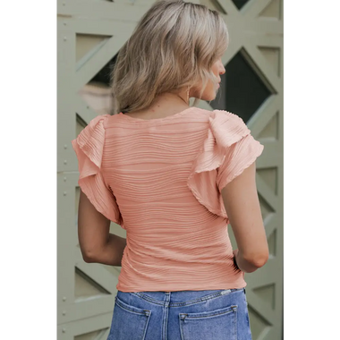 Peach-colored ruched top with ruffled cap sleeves in Euro sizes for a relaxed fit