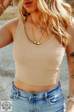 Beige Ribbed Knit Sheath Sleeveless Crop Top paired with light wash denim jeans for a relax look