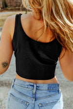 Black ribbed crop top with light wash denim jeans, ideal for relaxed styling in various sizes