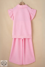 Pink two-piece Apricot Textured Ruffled Sleeve Zipped Top and Wide Leg Pants Set on hanger