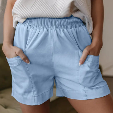 Light blue elastic waist shorts from Beau Blue, featuring a relaxed light wash design