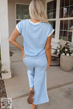 Light blue lounge set featuring Beau Blue Textured Colorblock Edge Tank Top and high waist pants