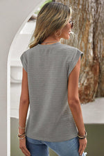 Gray sleeveless textured top with crew neckline in Beige Solid Textured Batwing T Shirt