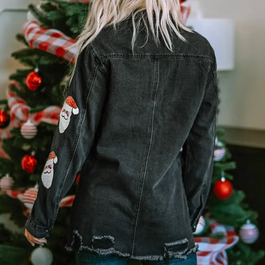 Distressed black denim jacket with Santa Claus patches for a relaxed holiday look