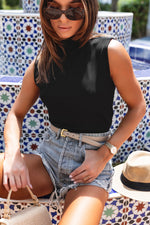 High-waisted denim shorts with a Black Solid Mock Neck Tank Top for stylish summer looks