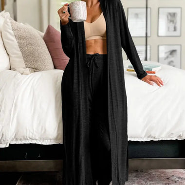 Long black knit cardigan styled open front, perfect for relaxing in various sizes