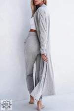 Long light gray cardigan and matching pants set for stylish relaxation in various euro sizes