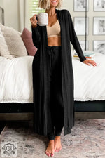 Long black knit cardigan with open front styling for a relaxed lounge set in euro sizes