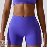 Purple block colour high waist yoga shorts and matching top for stylish workouts