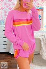 Pink lounge set featuring colorful stripes in the Bonbon Striped Accent Casual Set