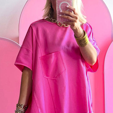 Hot pink oversized t-shirt with chest pocket, perfect for relaxed styles in all sizes