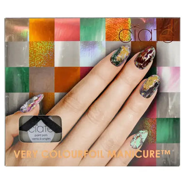 Manicured fingernails with glittery designs from Ciate Colourfoil Manicure Wonderland Presentset