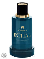 Teal Etienne Aigner Initial For Tonight perfume bottle with gold accents and black cap