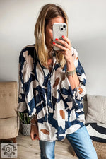 Flowy navy and white patterned tunic top with blue jeans in Euro sizes for relaxed style