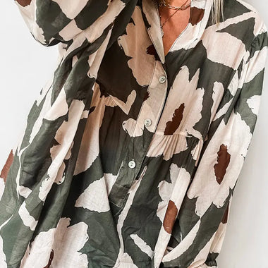 Flowy Four Leaf Clover Abstract Floral Print Blouse in green, white, and brown tones