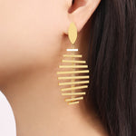 18K gold exquisite personalized fish bone and tassel design light luxury style earrings - QH Clothing