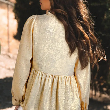 Gold Metallic Frilled Blouse featuring cream-colored ruffled design and long sleeves