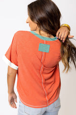 Coral-colored Grapefruit Orange Contrast Trim T-shirt with white trim, available in Euro sizes