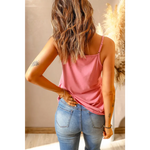 Pink spaghetti-strap tank top with fitted blue jeans, featuring sizes bust length hem