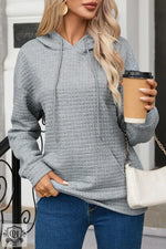 Grey textured pullover hoodie with quilted pattern, ideal for relaxation in various sizes