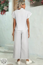 Woman’s white striped pantsuit from the Gray Stripe Zipped up Collar Ruffled Sleeve Tee outfit