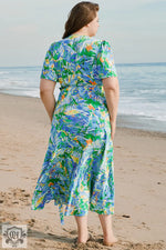 Floral print wrap dress in Green Leaves Print, ideal for various sizes bust hem