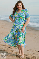 Floral print wrap dress featuring Green Leaves design in plus sizes for relaxed elegance