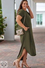 Olive green maxi dress featuring V neck, rolled cuffs, and flattering bust shoulder sleeve