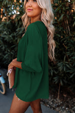 Emerald green oversized sweater with three-quarter sleeves for ultimate relax comfort