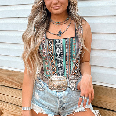 Sleeveless Green Western Geo Printed Square Neck Tank Top with distressed denim shorts