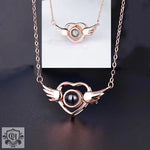 Heart and Wings Projection Necklace: A Symbol of Noble Love and Freedom -  QH Clothing