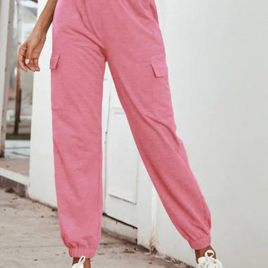 Pink cargo sweatpants featured as High Waist Trousers with Pockets for stylish comfort