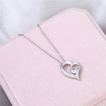 Exquisite Hollow Heart Zircon Pendant Necklace: A Luxurious Gift for Mom -  QH Clothing