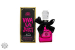 Pink and black Viva La Juicy Noir perfume bottle with a bow from Juicy Couture Viva